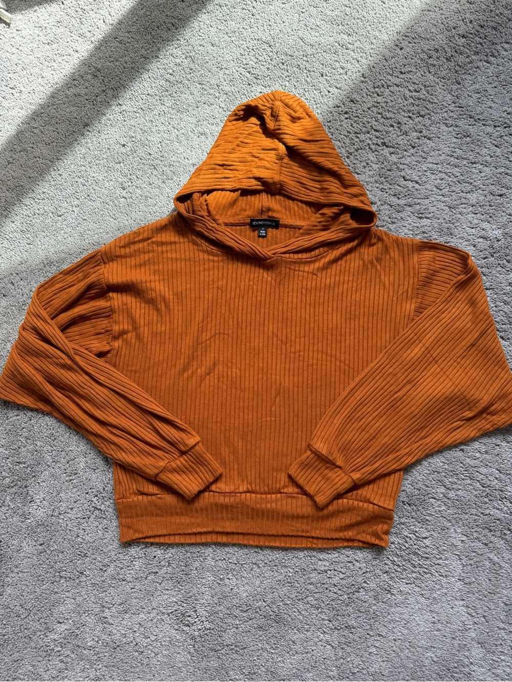 Beyond Yoga Ribbed Hooded Sweater in Rust Orange